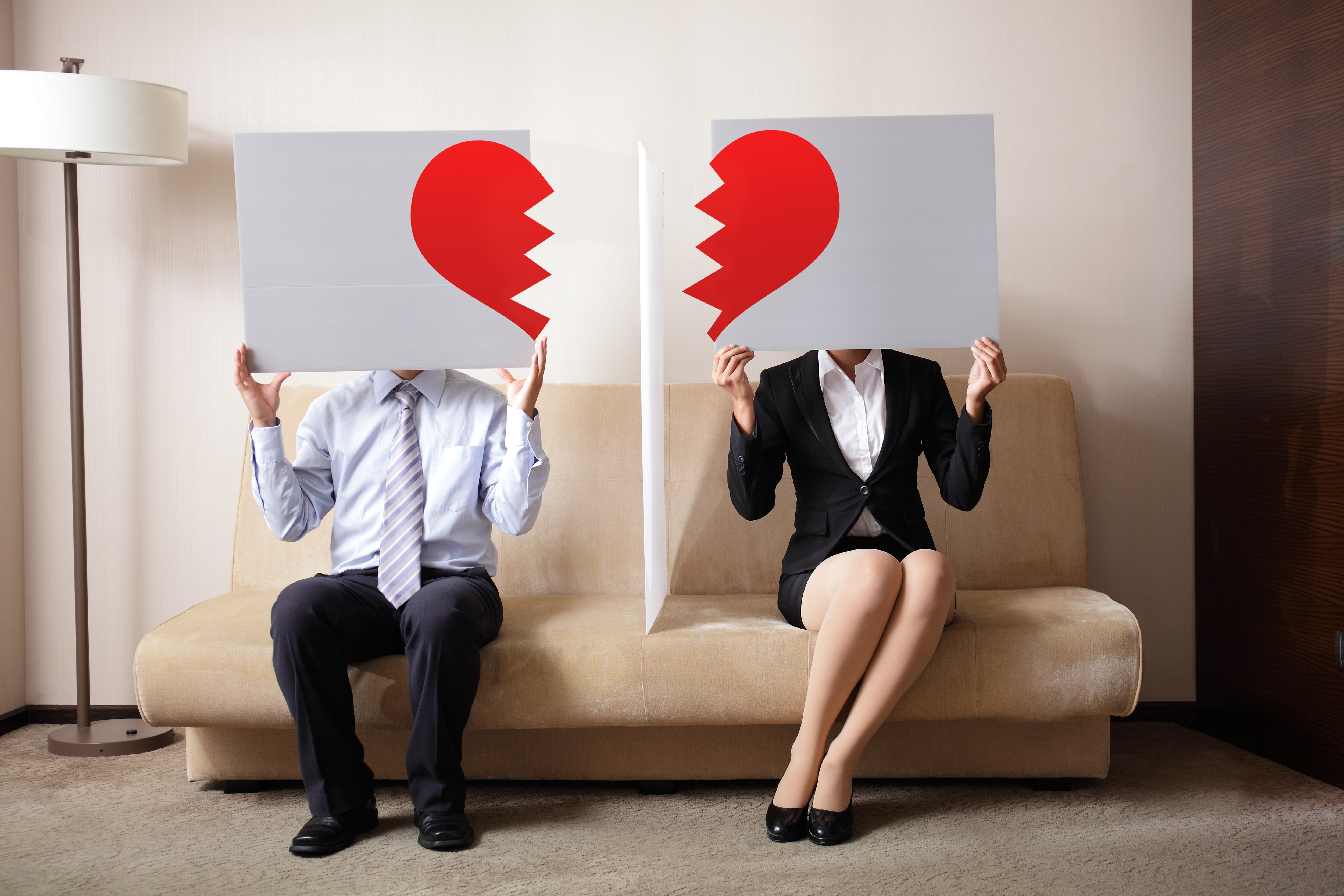 sad-young-couple-holding-billboard-sign-break-love-heart